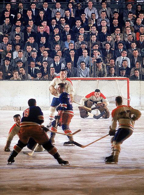 Montreal Canadiens goalie Jacques Plante surveys the ice without a mask during a game between the Canadiens and the New York Rangers at Madison Square Garden. Plante was the first NHL goalie to wear a goaltender mask on an everyday basis, a practice he started during the 1959-60 season. Nhl Goalie, Rangers Hockey, Hockey Pictures, Hockey Game, Hockey Life, Hockey Goalie, Hockey Games, Hockey Fans, Square Garden