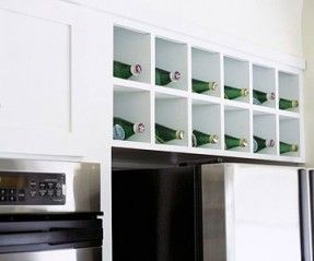 Wine Rack Storage Ideas Replace an enclosed cabinet above the refrigerator with a wine rack. Over Refrigerator Storage, Enclosed Fridge, Over Fridge Storage, Above Fridge Ideas, Storage Above Fridge, Small Liquor Cabinet, Above The Fridge, Above Fridge, Girls Bedroom Storage