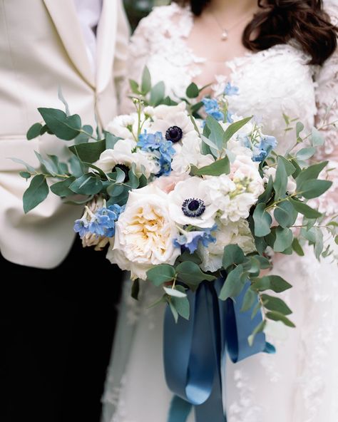 Dive into Elegance with Doris Ione: A Stunning Bridal Bouquet in Blue, White, and Greenery! 🌿💙 Let our vibrant blooms and lush greenery create a picturesque bouquet that perfectly complements your special day. Blue And Green Bouquet, White Winter Wedding, Wedding 2025, New Orleans Wedding, Flower Party, Organic Style, Lush Greenery, Bridal Bouquets, Intimate Weddings