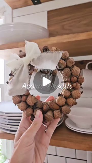 Amanda 🔨 Handmade On Poplar on Instagram: "This little acorn wreath sure makes me smile when I see it! I used a wreath ring I had from another project, but these can be purchased inexpensively at craft stores or in bulk packs on Amazon (comment “wreath” if you need a link). You could even cut your own out of sturdy cardboard! I used hot glue to attach my acorns to the ring and added a chiffon bow.

** If you follow the steps to preserve your acorns prior to crafting, your project should last for years! See my acorn story highlight for all the details + some other fall acorn craft projects. **

Rustic, reclaimed shiplap pumpkin sets are available in my Etsy shop. Link in bio or comment “etsy” for a DM. Follow along @handmadeonpoplar for simple and eco friendly DIY projects, garden, and hom Acorn Wreath Diy, Diy Acorn Crafts, Acorn Top Crafts, Acorn Wreath, Eco Friendly Diy, Fall Acorns, Acorn Crafts, Fall Arts And Crafts, Top Crafts