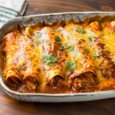 Chicken Enchiladas with Red Sauce is a beloved Mexican dish that offers a perfect blend of tender shredded chicken, a rich and flavorful red enchilada sauce, and melted cheese, all rolled up in soft corn tortillas. Baked until bubbly and golden, this dish is a comforting and satisfying meal that's great for family dinners, potlucks, or any occasion that calls for a flavorful, heartwarming dish. With the right balance of spices, heat, and creaminess, these chicken enchiladas are sure to be a ... Chicken Enchiladas Easy Red Sauce, Red Sauce Enchiladas, Chicken Enchiladas With Red Sauce, Enchiladas With Red Sauce, Runza Casserole, Homemade Red Sauce, Chili Enchiladas, Enchiladas Chicken, Mexican Food Dishes