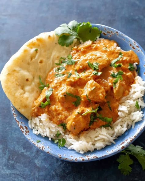 Slow Cooker Butter Chicken - throw it in a crockpot and enjoy creamy chicken over rice. #slowcooker #butter #chicken Slow Cooker One Pot Meals, Easy Crockpot Butter Chicken, Crockpot Indian Butter Chicken, Indian Butter Chicken Crockpot, Chicken Tight Recipe, Butter Chicken Crockpot, Crock Pot Butter Chicken, Crockpot Butter Chicken, Slow Cooker Butter Chicken