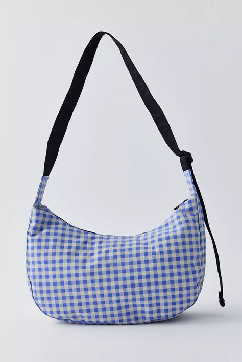 Product Sku: 89855530; Color Code: 059  BAGGU medium nylon crescent bag in a UO exclusive gingham print. BAGGU’s crescent bag in a medium size that’s effortlessly casual and large enough to carry more than just the essentials. Comfy BAGGU shoulder bag silhouette with an adjustable tonal logo strap, it wears comfortably across the body or on the shoulder for a hands-free experience. Baggu Crescent Bag Decorated, Baggu Mini Cloud Bag, Baggu Crescent, Cresent Baggu Bag, Baggu Standard Bag, Baggu Leather, Bag Silhouette, Crescent Bag, Tote Bags Sewing