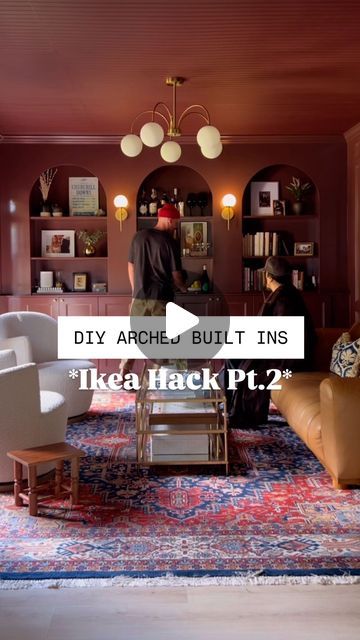 HEATHER & SEAN | DIY & DESIGN on Instagram: "PART TWO of our DIY Arched Built In IKEA hack! Let us know in the comments if you’re gonna give this one a try 😎  Paint color is Nicolson Red by @benjaminmoore   #diyhomeprojects #diy #diyhome" Ikea Arched Shelf Hack, Ikea Hemnes Built In Hack Tv Units, Diy Ikea Arched Bookshelf, Diy Ikea Built Ins, Arch Bookshelf Built Ins Diy, Ike’s Built In Hack, Built In Tv Wall Unit, Tv Wall Unit, Ikea Diy