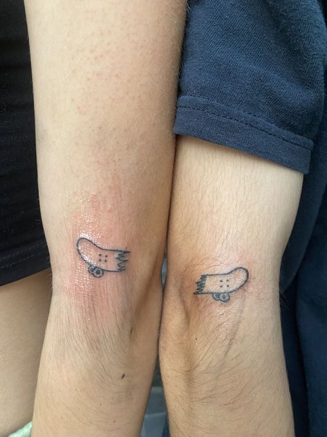 Tiny Skateboard Tattoo, Matching Tattoos Couples Emo, Matching Punk Tattoos, Small Skateboard Tattoo, Simple Skateboard Tattoo, Matching Guy Tattoos, Matching Alternative Tattoos, Matching Video Game Tattoos, Skateboarding Tattoo Ideas