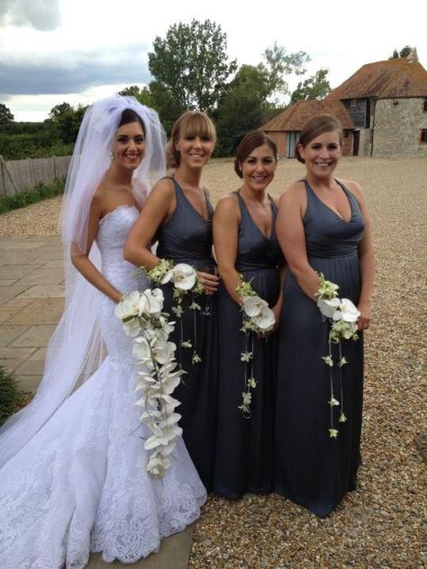 Bouquets always look best when carried by the bride. How stylish do the bridesmaids look with their wrist corsages. Bridal Corsage Wrist The Bride, Wrist Bouquet Wedding, Cherry Blossom Wedding Decor, Bridesmaid Bouquet Alternatives, Lilac Wedding Bouquet, Wedding Flower Jewelry, Bridal Cuff, Wrist Corsages, Cascading Wedding Bouquets