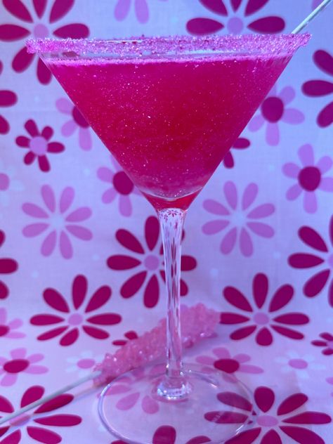 Pink Barbietini cocktail and mocktail recipe Y2k Party Drinks, Y2k Drinks, Pink Glitter Cocktail, Cowgirl Cocktail, Y2k Cocktail, Ruth Handler, Barbie Cowgirl, Rock Candy Sticks, Pink Dragon Fruit