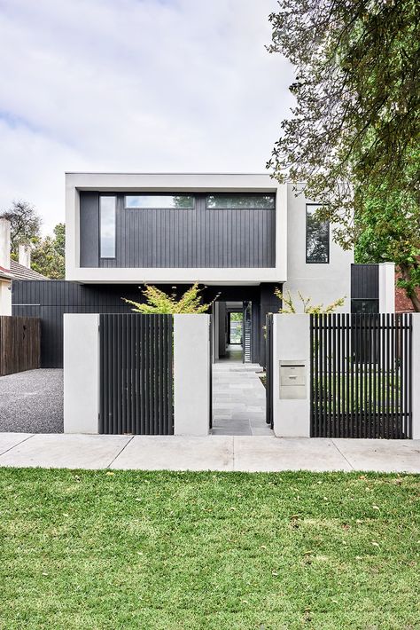 The modern appeal of symmetry and light in this modern façade maximises its aspect and illuminates the home from within. Architectural Facade, Aerated Concrete, Front Fence, Front Gates, Australian Architecture, Timber Cladding, Custom Built Homes, Custom Home Designs, Home Building Design