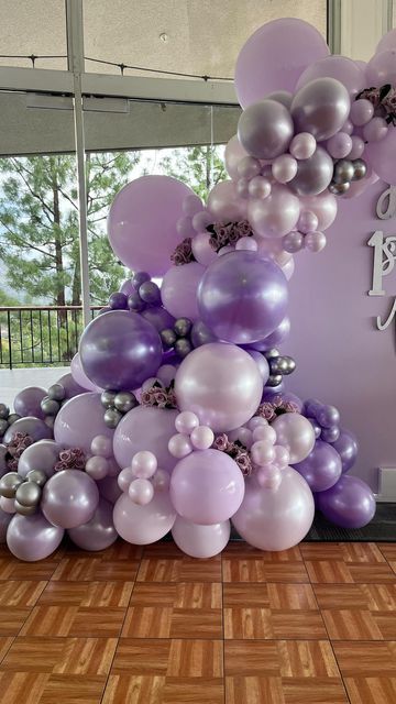 Events By Maggie LLC on Instagram: "Happy 1st birthday Backdrops by @craftymustache Balloons from @dulceriacandyspots Signage from @ldwoodworkcreations #balloons #balloonsecoration #party #happybirthday #partyideas #supportsmallbusinesses #booknow #balloonarch #purpleballoons #event #eventdecor #decorations #1stbirthdaypartyideas #flowers #balloonclasses #balloonteacher #ballooncolumns #balloonstylist" Lavender Theme Party Decoration, Purple Balloon Garland Backdrop, Purple Backdrops For Parties, Lavender 16 Birthday Party Ideas, Purple 18th Birthday Party Ideas, Lavendar Party Decor, Lavender Haze Party Theme, Lilac And Silver Party Decorations, Purple Balloon Backdrop