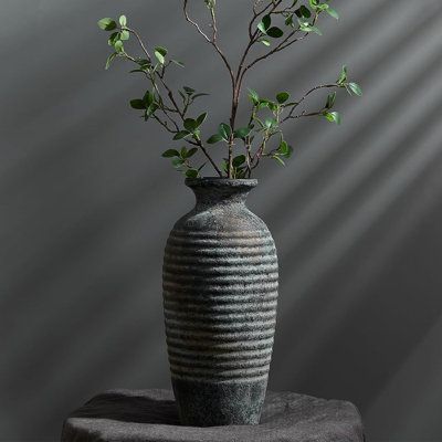 【Long Lasting High Quality】This large vintage vase can set the stage anywhere in your home. This boho vase exudes timeless charm and is built to last, keep your decor looking fresh and up-to-date year after year. 【Versatile Decor Piece】The terracotta vase measures 14.4" height and 6.5" width. Perfect for fresh or dried flowers. Effortlessly elevate the aesthetics of any room -be it your living room, kitchen, bedroom, bathroom, or office-with our product. It seamlessly blends with various decor styles, including boho, rustic, modern farmhouse, and cottagecore. For an extra pop of color, simply add your favorite faux or fresh flowers. 【Warm and Rustic style】This farmhouse vase is designed to show the simple and rustic style. Watertight design enables the ceramic vase boho table decor suitabl