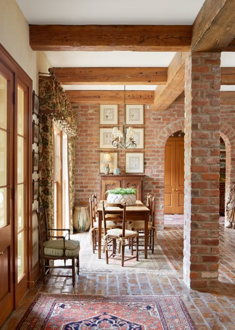 Interior Brick Floor, Brick Stairwell Interior, Brick House Interior Ideas, Brick Columns Interior, Brick Wall Dining Room, Brick House Interior, Red Brick Interior, Brick Floors, Brick Archway