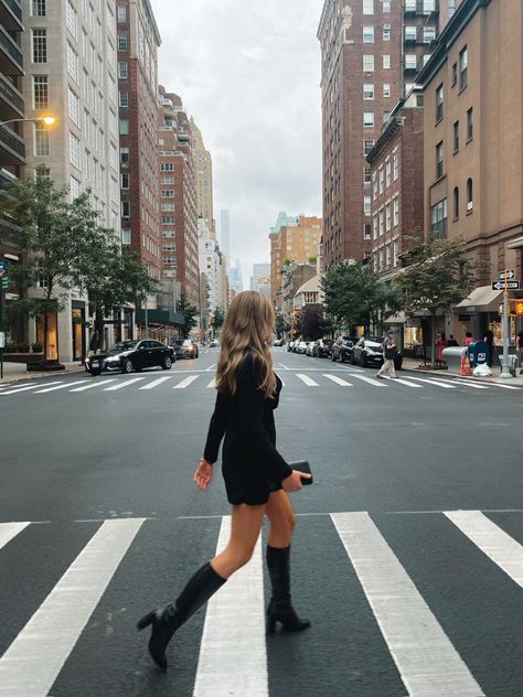 Blonde Girl walking across a street in the ipper east side in new york city in a black mini dress and black knee high boots Walking City Aesthetic, Nyc Photoshoot Ideas, New York Photoshoot, Street Fashion Photoshoot, Europe Pics, City Photoshoot, New York City Pictures, City Picture, City Girl Style