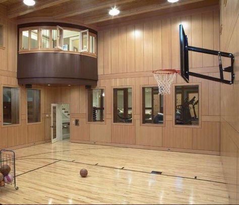 Indoor basketball court. Neeed this. The upstairs space that looks over the court could be the room with the aerial supplies. Home Basketball Court, Basketball Room, Indoor Basketball Court, Indoor Gym, Indoor Basketball, Basketball Hoop, Luxury Homes Dream Houses, Trendy Home, House Goals