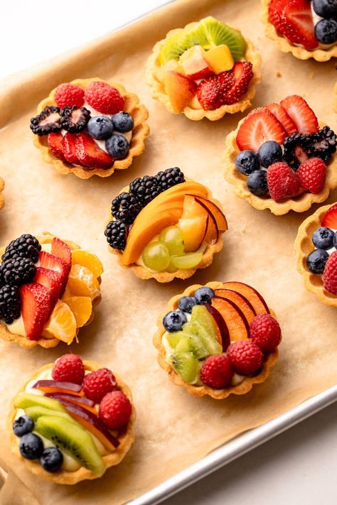 These Mini Fruit Tartlets are the perfect two-bite desserts, featuring mini tart crusts filled with a simple mascarpone cream, topped with fresh fruit, and finished with an optional but beautiful glaze. Mini Tart Pan Recipes, Fruit Tarts Recipe Dessert, Fruit Tarts Mini, Mini Fruit Tart Recipe, Fruit Tart Mini, Mini Fruit Tart, Fruit Tart Recipe Mini, Easy Turkey Recipes Thanksgiving, Fruit Tartlets