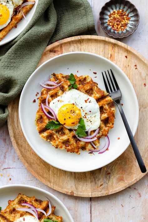 Delicious crunchy cheesy Hash Brown Waffles made with potatoes, cheddar cheese, garlic, marjoram, and eggs. The recipe uses a gluten-free flour mix but you can use all-purpose flour too. Hash browns in the form of waffles are truly life-changing! The waffles are freezer-friendly which makes them perfect for meal prep and stocking up. Great as a side for breakfast or brunch, or just anytime you're craving something cheesy and salty. Waffle Eggs Breakfast, Salty Waffles, Eggo Thick And Fluffy Waffles, Easy Hashbrowns, Hashbrown Waffles, Yeasted Waffles, Eggo French Toast Waffles, Hash Brown Waffles, Cheese Waffles