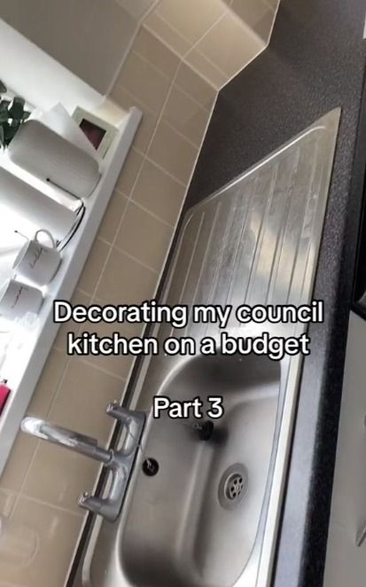 A DIY fan has shared how she transformed her council house kitchen for just £14 and it’s blown people’s minds.  The savvy lady was sick of her drab worktop so decided to give it a glow-up on a shoestring budget, using sticky flooring from B&M.  The woman, who posts under the username Homewithnumber7, is part […] Council House Kitchen Makeover, Council Kitchen Makeover, Council House Kitchen, Council House Makeover, Tile Effect Vinyl Flooring, Shoestring Budget, Black Floor Tiles, Council House, Kitchen Vinyl