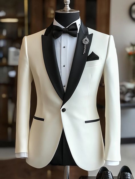 Elevate your formal look with this stunning white tuxedo. Visit our website to make it yours.   #DapperStyle #FormalElegance #menssuitstyle #mensfashion #menssuits #mensstyle #suitstyle #suits #menstyle #suitup #menswear #suitandtie #men #dapperfashion #style #suitsformen #mensfashionblog #suited Wedding Dress For Men Suits Groom Style, White And Black Wedding Suit, Reception Blazers For Men, Purple And White Suit, Ivory Suit Groom, White Tuxedo For Men Wedding, White Suits Wedding, Types Of Suits For Men, Korean Groom