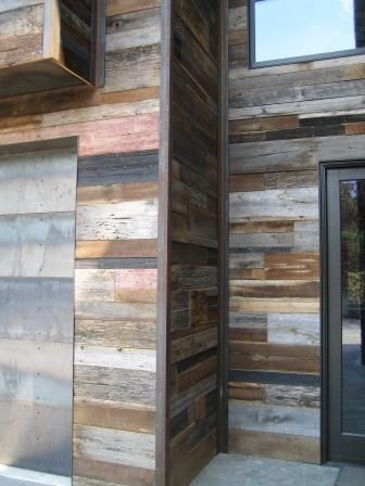 Reclaimed wood siding, I really like the look of this for exterior finishes. Gotta figure it will last awhile, likely lasted over a hundred years the first time around. Reclaimed Wood Siding, Barn Siding, Reclaimed Lumber, Deco Wall, Wine Store, Wood Siding, Wood Panels, Gym Inspiration, Exterior Wood