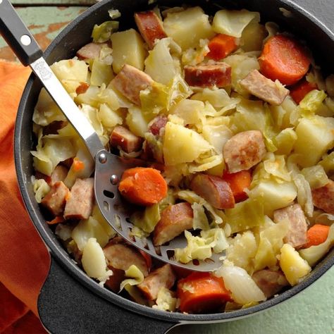 We look at how to pull off Dutch oven baking, including sourdough bread, baked chicken, all kinds of potatoes and more. Cabbage And Smoked Sausage, Cabbage Sausage, Sausage And Cabbage, Sausage Stew, Smoked Sausage Recipes, Cabbage And Sausage, Sausage Potatoes, Dutch Oven Recipes, Vegan Sausage