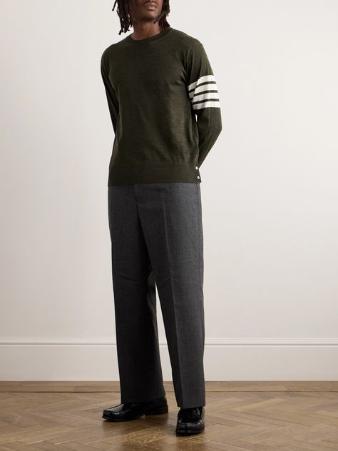 This sweater is one of Thom Browne's most recognisable styles. It's knitted from soft merino wool and trimmed with the brand's signature grosgrain stripes and mother-of-pearl buttons at the cuffs and hems. Small to size. See Size & Fit notes. Thom Browne Sweater, Latest Sweater, Sweater For Men, Jacquard Sweater, Roll Neck Sweater, Half Zip Sweaters, Loungewear Shorts, Merino Wool Sweater, Pearl Buttons