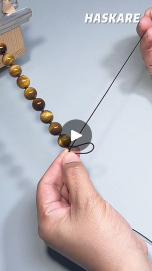 2.4K views · 42 reactions | The quickest way to weave a knot into your bracelet#beaded #diyjewelry #shorts #design #haskare #diyjewelry #knot #diybeads #pfy | Haskare | Sojeso · Attack Shorts Design, Stone Necklace Set, Bracelet Knots, Bracelet Beaded, Knot Necklace, Diy Beads, Stone Necklace, Wearable Art, Necklace Set