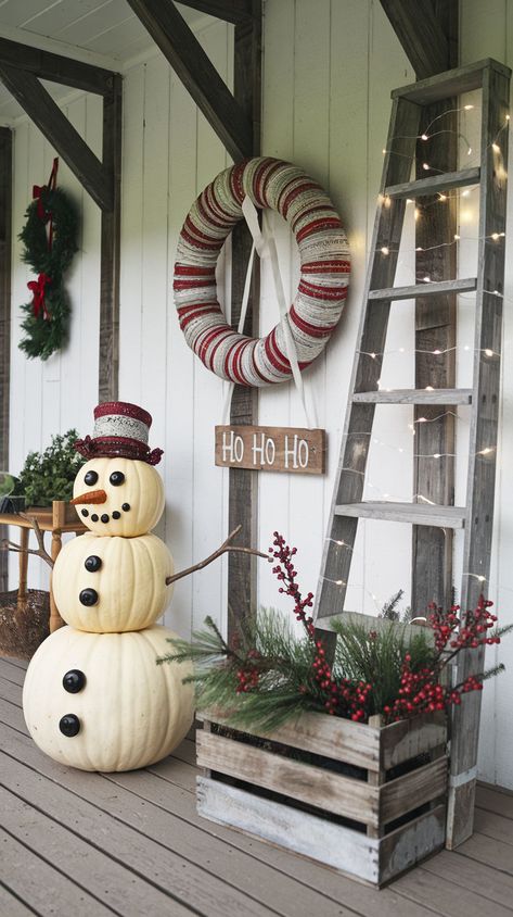 A charming porch with a farmhouse-style bench draped with a red plaid blanket and pillows featuring reindeer designs. Christmas Porch Bench Decorating Ideas, Outdoor Bench Christmas Decorating Ideas, Christmas Bench Ideas Front Porches, Outdoor Bench Holiday Decor, Decorate Porch Bench For Christmas, Plaid Blanket, Christmas Porch Decor, Christmas Porch, Red Plaid