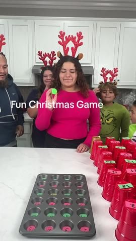 Super Fun Holiday Game 🧑‍🎄 Dad and family bounce ping pong balls int... | christmas games ideas 2023 | TikTok Christmas Pong Party Games, Christmas Muffin Tin Game, Games Using Ping Pong Balls, Ping Pong Prize Game, Muffin Tin Christmas Game, Ping Pong Ball Christmas Game, Ping Pong Muffin Tin Game, Kids Christmas Games With Prizes, Ping Pong Ball Muffin Tin Game