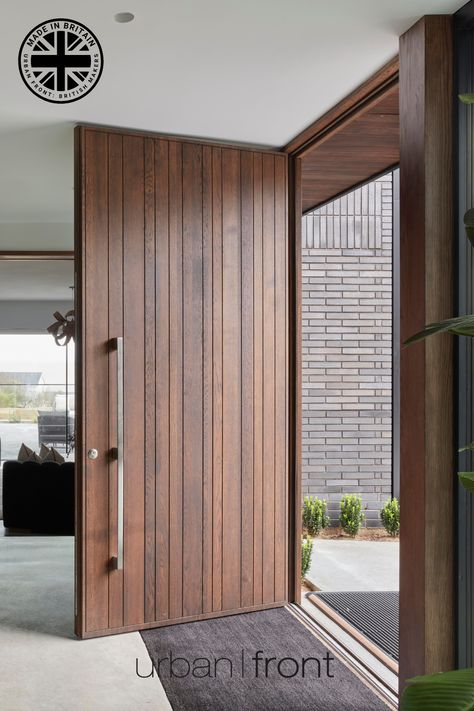 Contemporary, steel reinforced, walnut hardwood door. Designed & handcrafted in Britain. Delivered worldwide. Discover Urban Front's luxury door ranges now.   #UrbanFront #doorcouture #madeinbritain #frontdoor #doordesign #contemporarydesign #contemporaryarchitecture #contemporaryhome #walnutinteriors #contemporarystyle #luxuryproperties  #interior_design #interiordesigninspiration  #walnutdoor #handcrafted  #architecturalhome Wooden Door Design For Rooms, Natural Wood Door Exterior, Walnut Front Door Modern, Teak Door Design Modern, Modern Wooden Doors Entrance Front Entry, Main Door Wooden Design, Teak Main Door Design Entrance, Teak Door Design, Main Door Design Entrance Modern Luxury