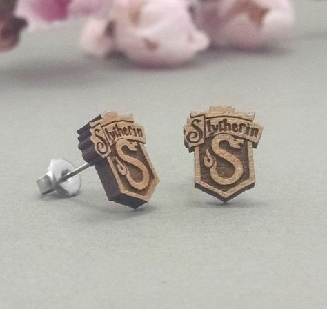 Harry Potter Slytherin Crest Symbol Laser Engraved Wood Post Earrings by JuniperandIvy on Etsy https://www.etsy.com/listing/204375033/harry-potter-slytherin-crest-symbol Cunning Folk, Harry Potter Earrings, Slytherin Crest, Sleeping Dragon, Fandom Jewelry, Harry Potter Slytherin, Slytherin Pride, Hogwarts Letter, Hogwarts Crest