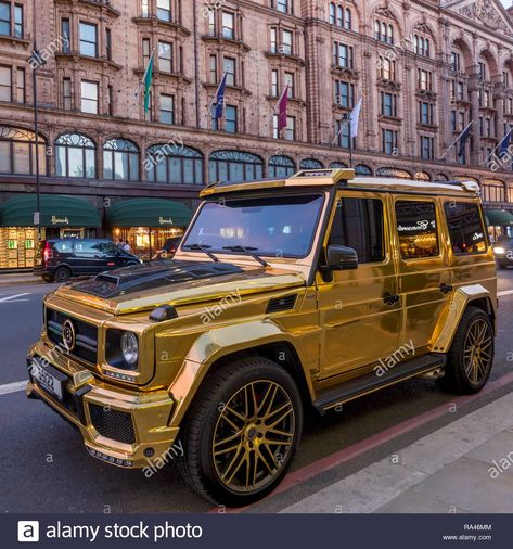 Download this stock image: Luxury car in gold paint, Mercedes Benz W463, G-Class, Brabus G850 6.0 Widestar, parked in front of Harrods department store - RA46MM from Alamy's library of millions of high resolution stock photos, illustrations and vectors. Luxury Jeep, Luxury Cars Inside, Gold Cars, Lowrider Show, Cars Inside, Car Side View, R34 Gtr, Gold Car, Tokyo Drift