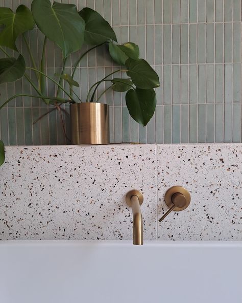 Loving the calm and serene vibe this space gives off. Our Kiepersol Alf tile with terrazzo tiles looks like a match made in heaven and @linelab_arch did good 😊 The masterfully designed ledge is a fantastic spot for a plant and even a painting which adds another layer of personality to this bathroom. We’re so glad to be able to share this with you. Terrazzo Floor Bathroom White Tiles, Terrazzo And Concrete Bathroom, Terrazzo Backsplash Bathroom, Bathroom With Ledge, Light Green Bathroom Tile, Grey Bathroom Tiles Colour Schemes, Terrazzo Bathroom Ideas, Calm Bathroom Ideas, Bathroom Tile Ideas Neutral