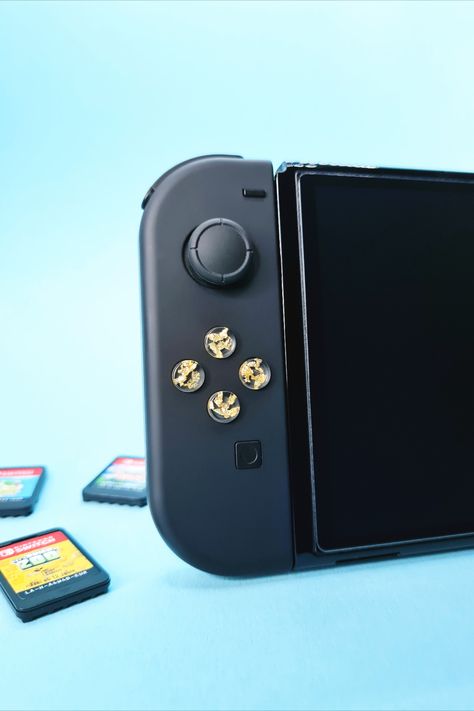 Customized White Nintendo Switch JoyCons with Gold Leaf Buttons Black Nintendo Switch, Nintendo Switch Joycons, Switch Joycons, Gamecube Controller, Game Controller, Gaming Setup, High Quality Design, Gold Buttons, Gaming Accessories