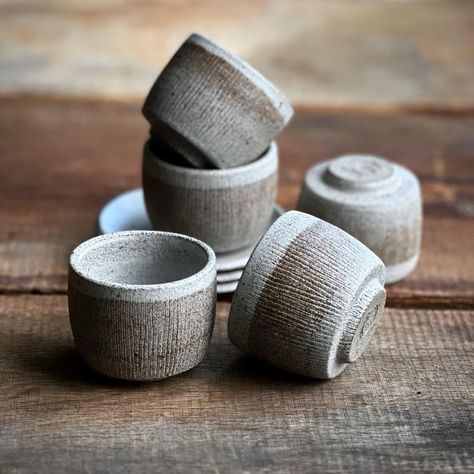 Kirsten Senz handmade pottery | plates 20 cm d stoneware, handcarved and glazed with black satin… | Instagram Espresso Cups Ceramic, Handmade Pottery Plates, Ceramic Cafe, Coffee Bar Design, French Pottery, Ceramic Texture, Porcelain Espresso Cups, Cerámica Ideas, Coffee Cup Design