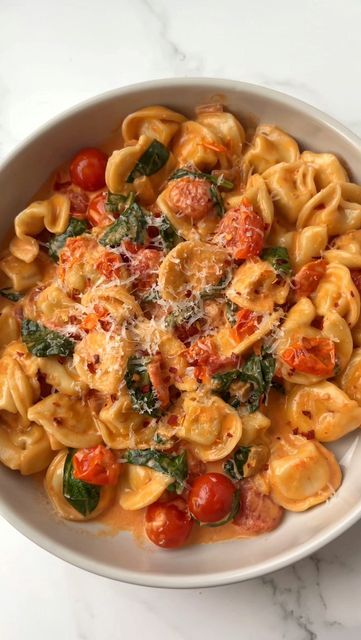 Laura • The Hungry Truffle on Instagram: "i’m tortellini in love with this 🍅🧀😋 creamy tomato cheese tortellini ⬇️ 1 tbsp butter 1 diced onion 1 minced clove of garlic 2 cups cherry tomatoes 1 tbsp tomato paste 1 cup heavy cream 1 cup parmesan cheese 1 cup chopped spinach add olive oil and butter to a skillet and sauté onions and garlic. throw in the tomatoes and let it cook down, pressing lightly on the tomatoes to burst. add tomato paste and red pepper flakes then heavy cream. let it simmer and then add cooked cheese tortellini, parmesan cheese, and spinach. mix together and then serve with more cheese!" Cooked Cheese, Sauté Onions, Tomato Cheese, Parmesan Sauce, Cheese Tortellini, Tomato And Cheese, Chopped Spinach, Saute Onions, Grape Tomatoes