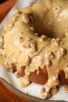 Praline Bundt Cake is a soft brown sugar bundt cake topped with pourable praline frosting. It’s as delicious as you think it might be. Maybe even more! Some desserts don’t really need a huge introduction, or a lot of descriptive words to entice you. I feel like the pictures of this cake are more than... Read More Praline Bundt Cake Recipe, Praline Bundt Cake, Brown Sugar Bundt Cake, Praline Icing, Praline Frosting, Icing For Cake, Brown Sugar Cakes, Praline Cake, Mini Bundt Cakes