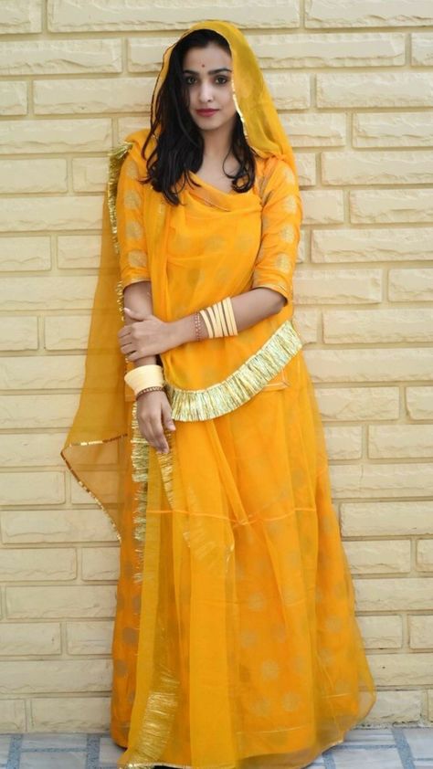 Rajasthani Rajputi Dress Poshak, Rajasthani Haldi Dress, Yellow Rajputi Poshak For Haldi, Simple Rajputi Poshak, Rajputi Dress Pose, Rajputana Dress Women, Rajasthani Poshak Designs, Rajputi Poshak Poses, Rajputi Dress Women