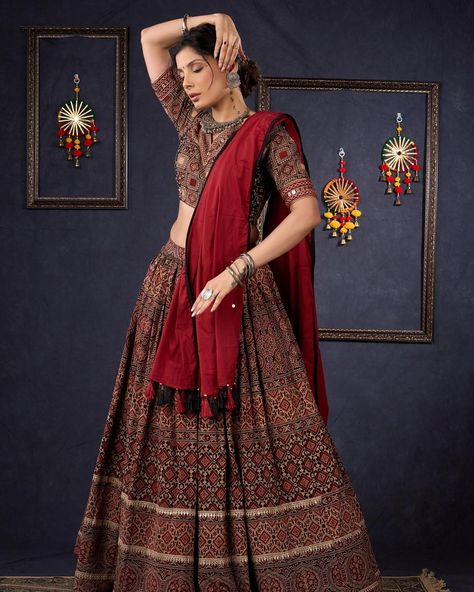 Indulge in the luxurious and exclusive world of fashion with our Elegant Maroon & Black Ajrakh Lehenga. Adorned with intricate Ajrakh print, this stunning lehenga comes with a matching blouse and dupatta, creating a timeless and elegant ensemble. Embrace sophistication and elevate your style with this beautiful piece. #sujatra #sujatraglobal #sujatralehenga #readymadelehenga #stitchedlehengacholi #lehengacholi #ajrakhprints #ajrakhlehenga #lehengalove Ajrakh Lehenga, Fabric Patterns Prints, Ajrakh Prints, Padded Blouse, Lehenga Choli, World Of Fashion, Fabric Patterns, Lehenga, Elevate Your Style