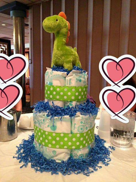 Alternative to a diaper cake - a baby wipes cake! Wipe Cake Shower Gifts, Diaper Cake Alternative, Baby Wipes Gift Ideas, Dino Diaper Cake, Dinosaur Diaper Cake, Dino Room, Diaper Cake Centerpieces, Dino Cake, Baby Wreath