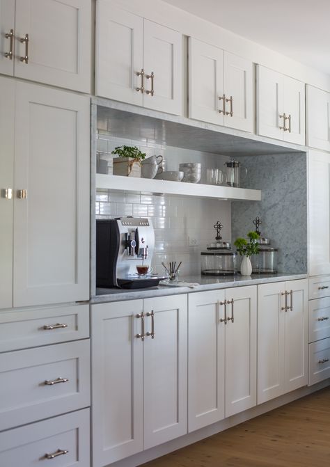 We love the way this clean white cabinetry contrasts the look of the silver stone slab counter and gold hardware in this kitchen design of our past projects! Kitchen Build In, Built In Wall Cabinets Kitchen, Kitchen Wall Unit, Kitchen With Wall Of Cabinets, Built In Bar In Dining Room, Kitchen Cabinets Wall, Kitchen Cabinet Design Layout, Wall Of Kitchen Cabinets, Kitchen Pantry Wall