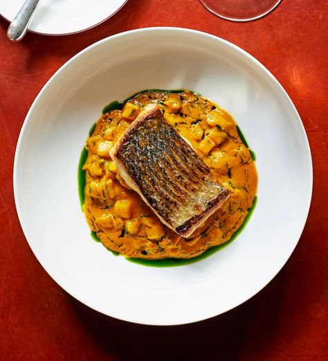 Roast-fillet-of-seabass-with-braised-shellfish-and-saffron-sauce Seabass Fillet Recipe, Sea Bass Fillet Recipes, Cooking Sea Bass, Grilled Sea Bass, Bass Recipes, Saffron Sauce, Baked Sea Bass, Grilled Courgette, Sea Bass Recipes