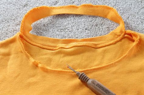 How to Turn a Crew Neck T-Shirt Into a V-Neck | eHow Altered T Shirts, Shirt Makeover, Fabric Shears, Cut Off Shirt, Sewing Alterations, Crew Neck Tshirt, Round Neck Shirt, Altering Clothes, Fabric Scissors