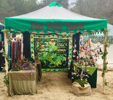 Our booth set up at a Renaissance Faire. 🧚🍄 . . #FaeFolkWorld #FaeFolk #Fairy #fairydoll #magical #fantasy #whimsical #fairies #fae #vendorbooth #fairiesforsale #renfaire #renaissance #booth #vendortent Fairy Booth Ideas, Fairy Vendor Booth, Wall Hanging Display Craft Fair, Whimsical Booth Display, Fairy Booth Display, Market Booth Ideas Display Stands, Witch Market Stall, Ren Fair Booth Ideas, Ren Faire Vendor Booth