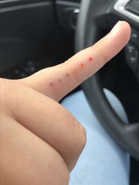 Color spectrum dot tattoo Colorful Dots Tattoo, Colored Dots Tattoo, Marvel Tiny Tattoo, Rainbow Dots Tattoo, Rainbow Dot Tattoo, Color Swatch Tattoo, Tiny Color Tattoos, Mini Rainbow Tattoo, Tiny Marvel Tattoos