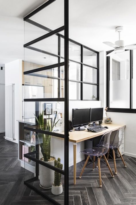 Office, Desk, Study Room Type, Porcelain Tile Floor, and Chair The glass-walled study is Efrat's favorite room in her home. Photo 9 of 21 in Budget Breakdown: A Stunning Apartment Revamp Mixes High and Low For Under $100K