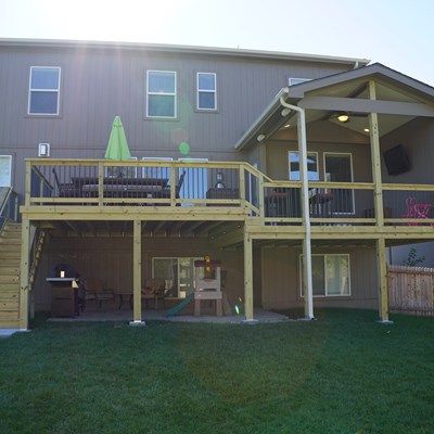 Gable roof structure with multi-level pressure treated decking. Gable Roof Porch, Roof Porch, Two Level Deck, Backyard Decks, Second Story Deck, Multi Level Deck, Tiered Deck, Dream Deck, Deck Installation