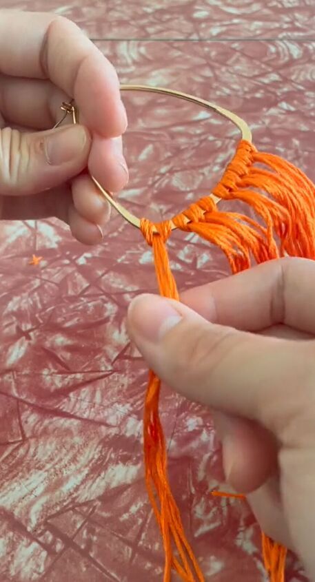 Grab some Walmart hoops and yarn. I am going to show you how to customize an adorable pair of DIY tassel earrings. Red Yarn Earrings, Yarn Tassel Diy, Bandana Earrings, Diy Yarn Earrings, Tassel Jewelry Diy, Yarn Earrings, Diy Tassel Earrings, Tassel Earing, Thread Up