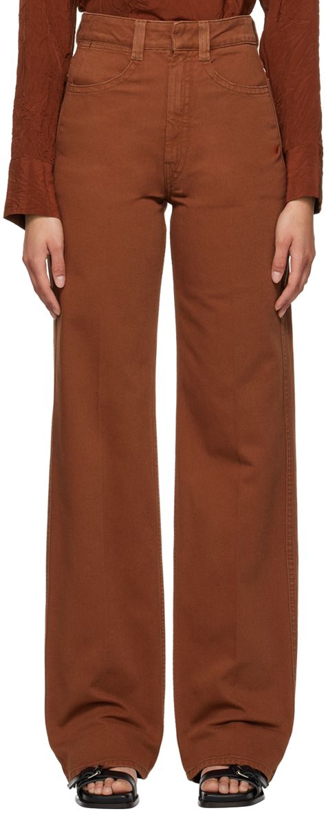 Heavyweight garment-dyed non-stretch denim jeans. · High-rise · Belt loops · Five-pocket styling · Zip-fly · Creased legs · Contrast stitching in brown Supplier color: Brick brown Rust Colour, Agent Orange, Christophe Lemaire, Brown Jeans, Bloomers Shorts, Deep Orange, Jean Trends, Birthday Board, Brown Pants