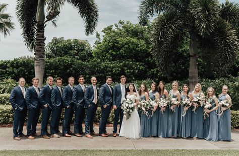 Steel blue, dusty blue, navy, blush wedding party, large wedding party, bridesmaids, groomsmen, Florida wedding  PC: Ashtyn Brooke Photo Steel Blue And Navy Wedding, Greyish Blue Wedding Theme, Steel Blue And Blush Wedding, Steel Blue Bridal Party, Slate Blue Bridal Party, Steel Blue Wedding Party, Bridesmaid Dresses With Navy Suits, Dusty Blue Bridal Party, Dusty Blue Wedding Party