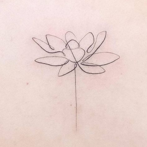 One line water lily tattoo located on the upper back. Lily Pad Tattoo Fine Line, Water Lily Minimalist Tattoo, Water Lily Outline Tattoo, Water Lillie Tattoos, Simple Waterlily Tattoo, Larkspur And Water Lily Tattoo Simple, Water Lily Line Tattoo, Water Lily Birth Flower Tattoo, Water Lily Line Art