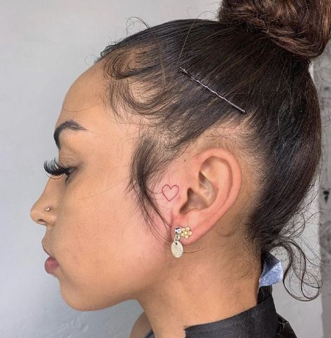 Female Small Face Tats, Heart Ear Tattoos For Women, Cute Tats Behind Ear, Small Tattoo By Ear On Face, Heart Tattoo On Side Of Face, Baddie Tattoo Ideas Female Behind Ear, W A Y S Tattoo Behind Ear, Quotes Behind Ear Tattoo, Mini Ear Tattoos